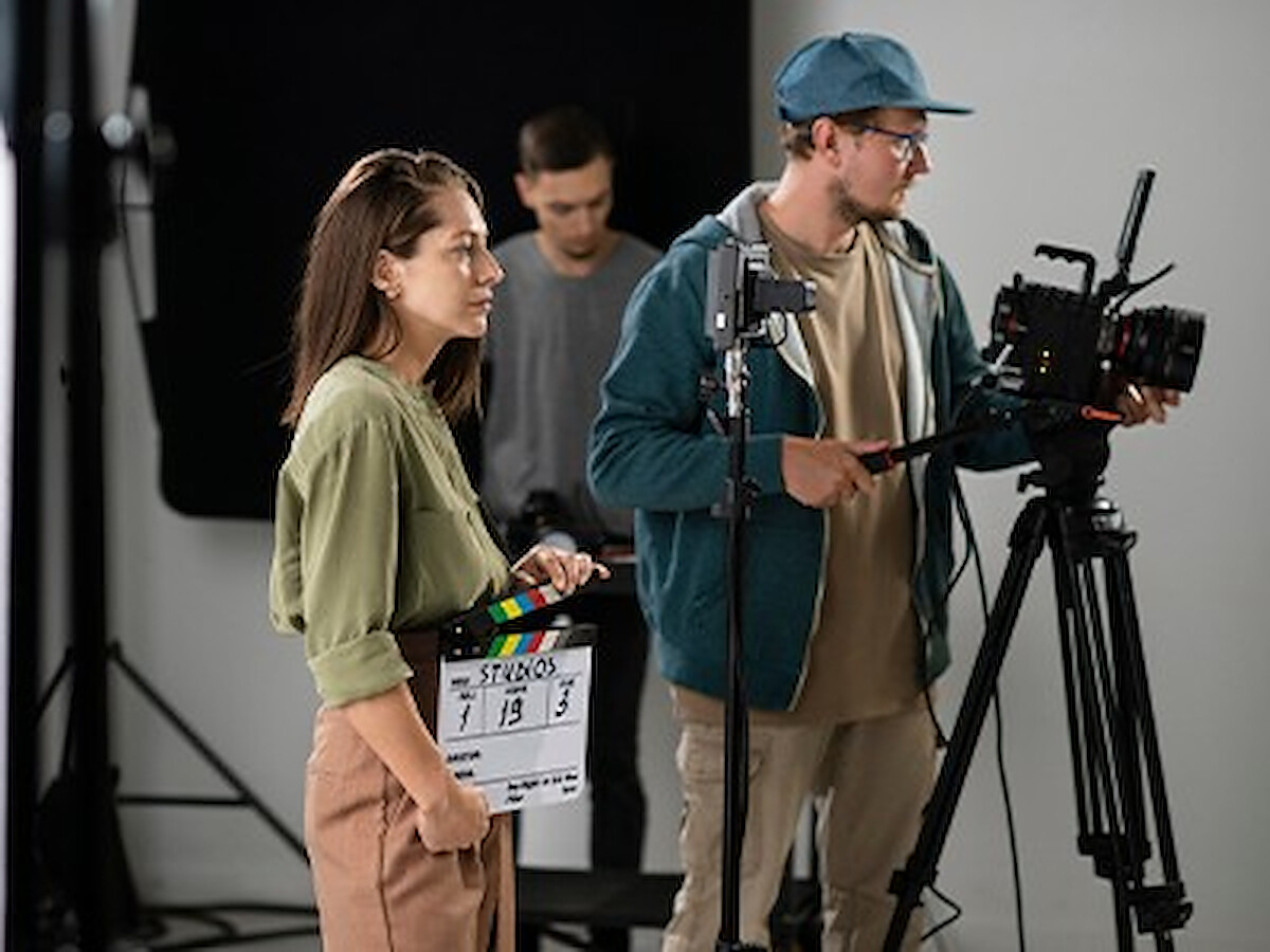 Creators filming in a studio